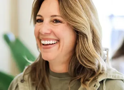 Smiling woman with a confident, natural-looking smile