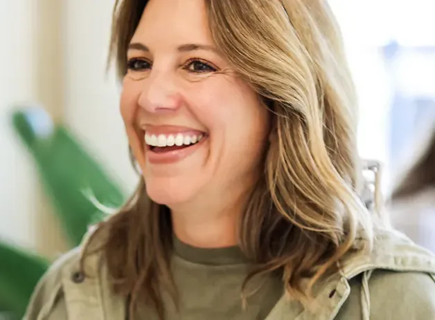 Smiling woman with a confident, natural-looking smile
